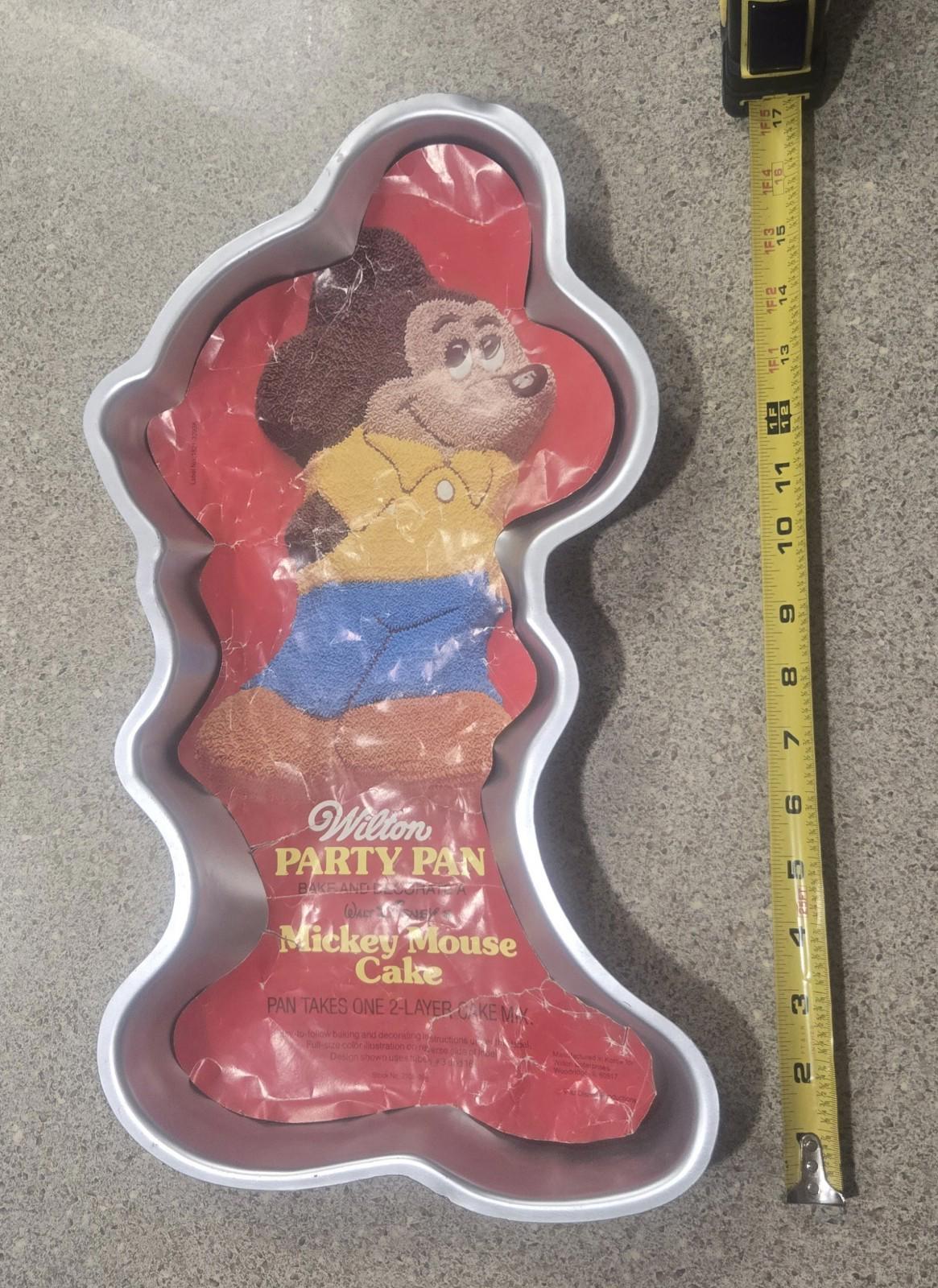 Wilton Vintage Cake Pans 10 PCs Playboy, Elmo, Pooh, Barney, Lamb chop Make Your Own Memories