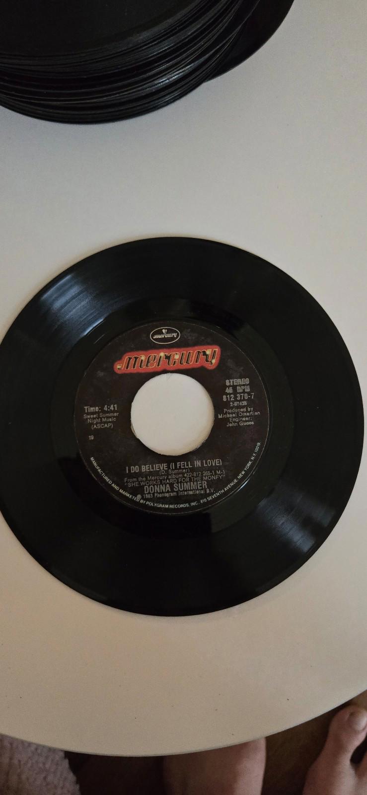 7-inch 45 RPM Vinyl RecordShe Works Hard For The MoneyI Do Believe (I Fell In Lo