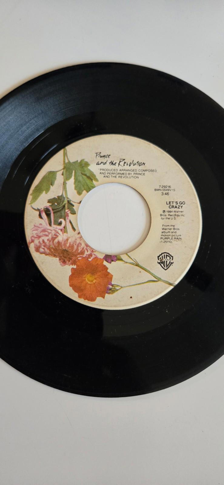 7-inch vinyl 45 RPM LP "Let's Go Crazy". "Erotic City" by Prince and The Revolut