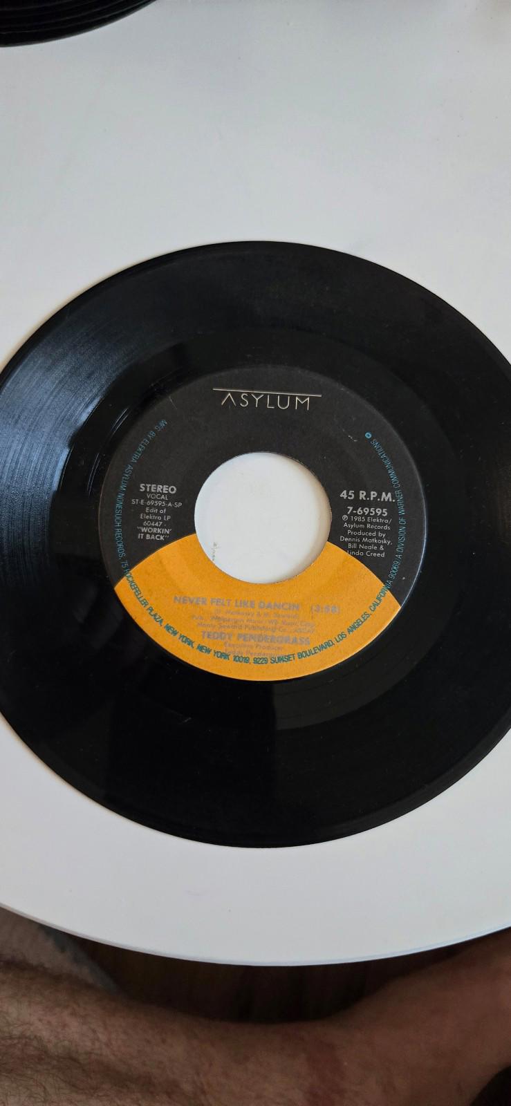 7-inch vinyl 45 RPM LPLove Emergency" and "Never Felt Like Dancin'". by Teddy