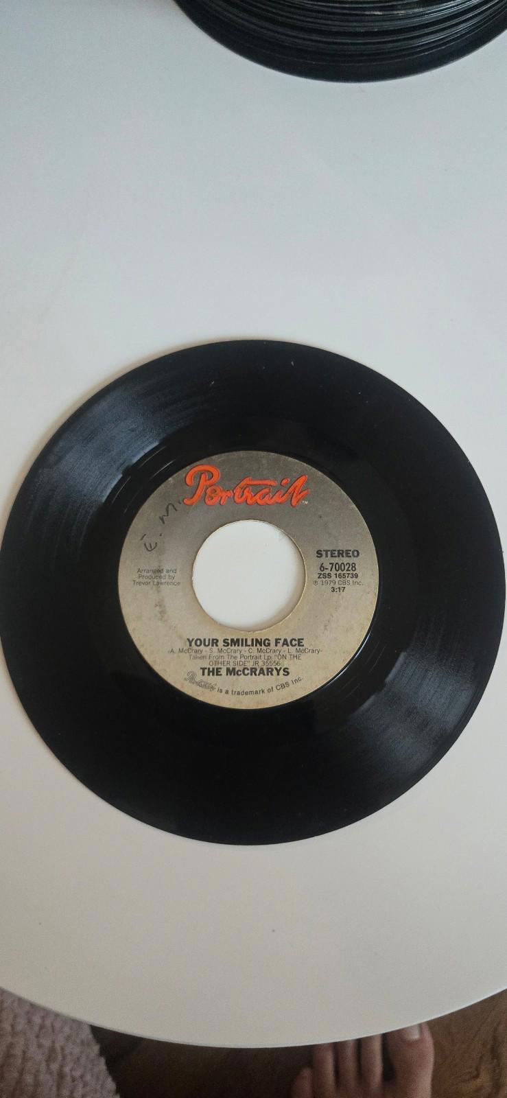 7-inch 45 RPM Vinyl "Looking Ahead" "Lost in Loving You" By The McCrarys