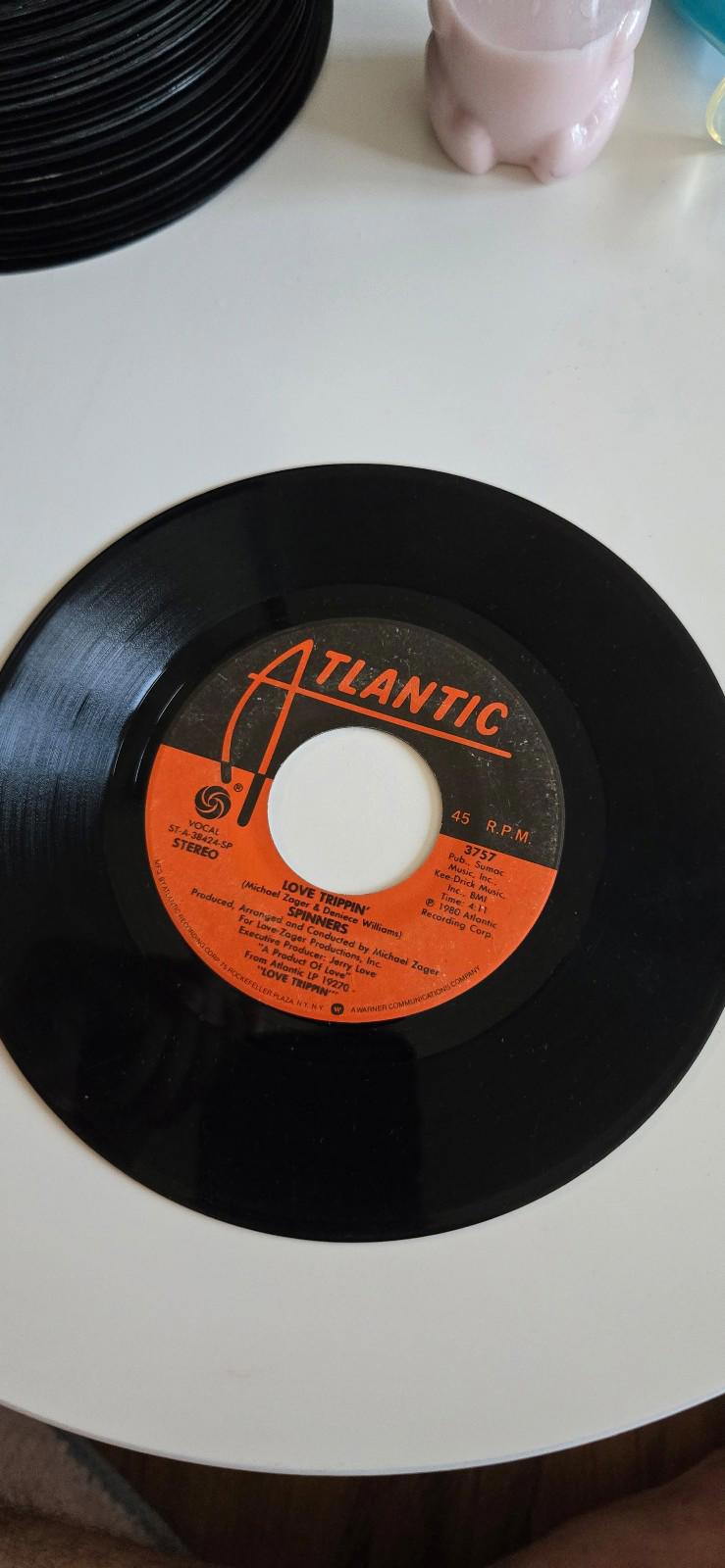 7-inch vinyl 45 by The Spinners "Now That You're Mine Again", "Love Trippin"