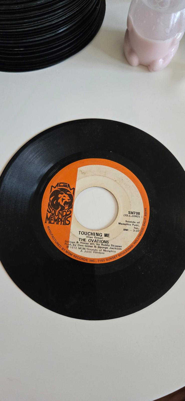7-inch 45 RPM vinylTouching Me" by The Ovations.