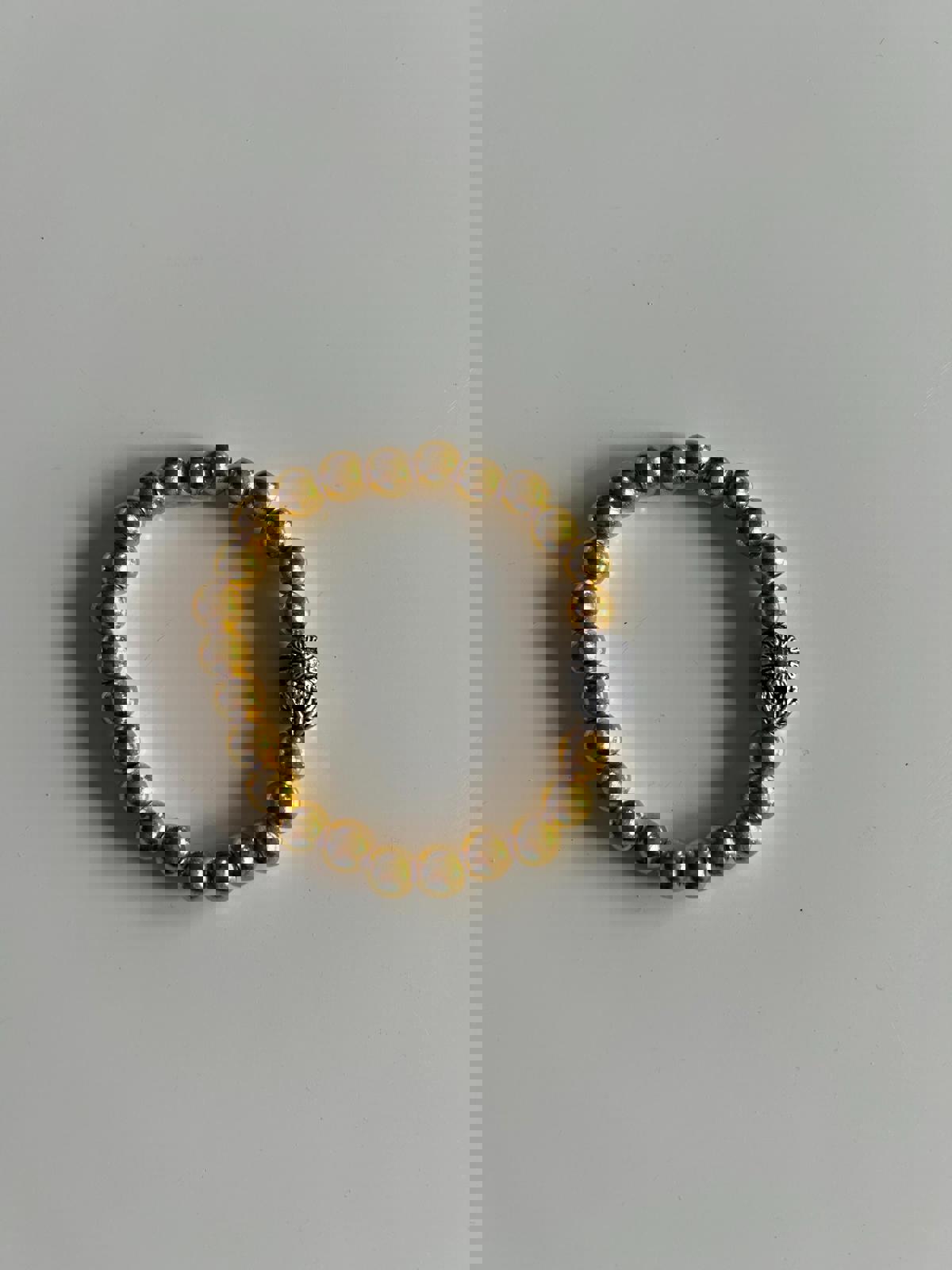 Gold Beaded Bracelet with Silver Sun Charm