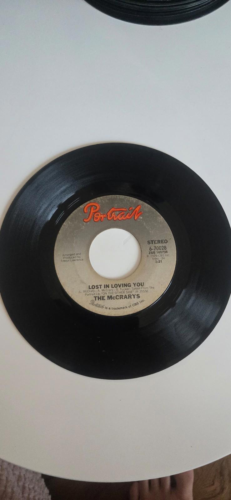 7-inch 45 RPM Vinyl "Looking Ahead" "Lost in Loving You" By The McCrarys