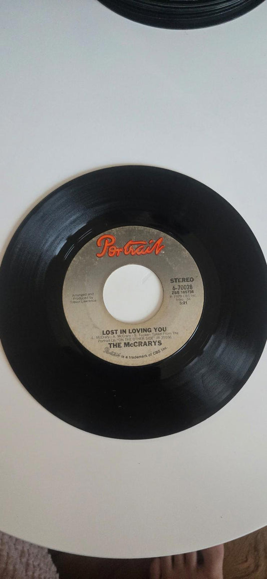 7-inch 45 RPM Vinyl "Looking Ahead" "Lost in Loving You" By The McCrarys
