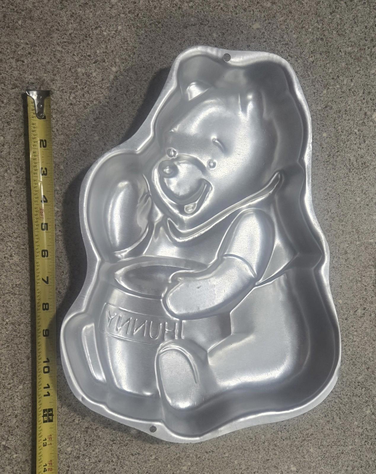 Wilton Vintage Cake Pans 10 PCs Playboy, Elmo, Pooh, Barney, Lamb chop Make Your Own Memories