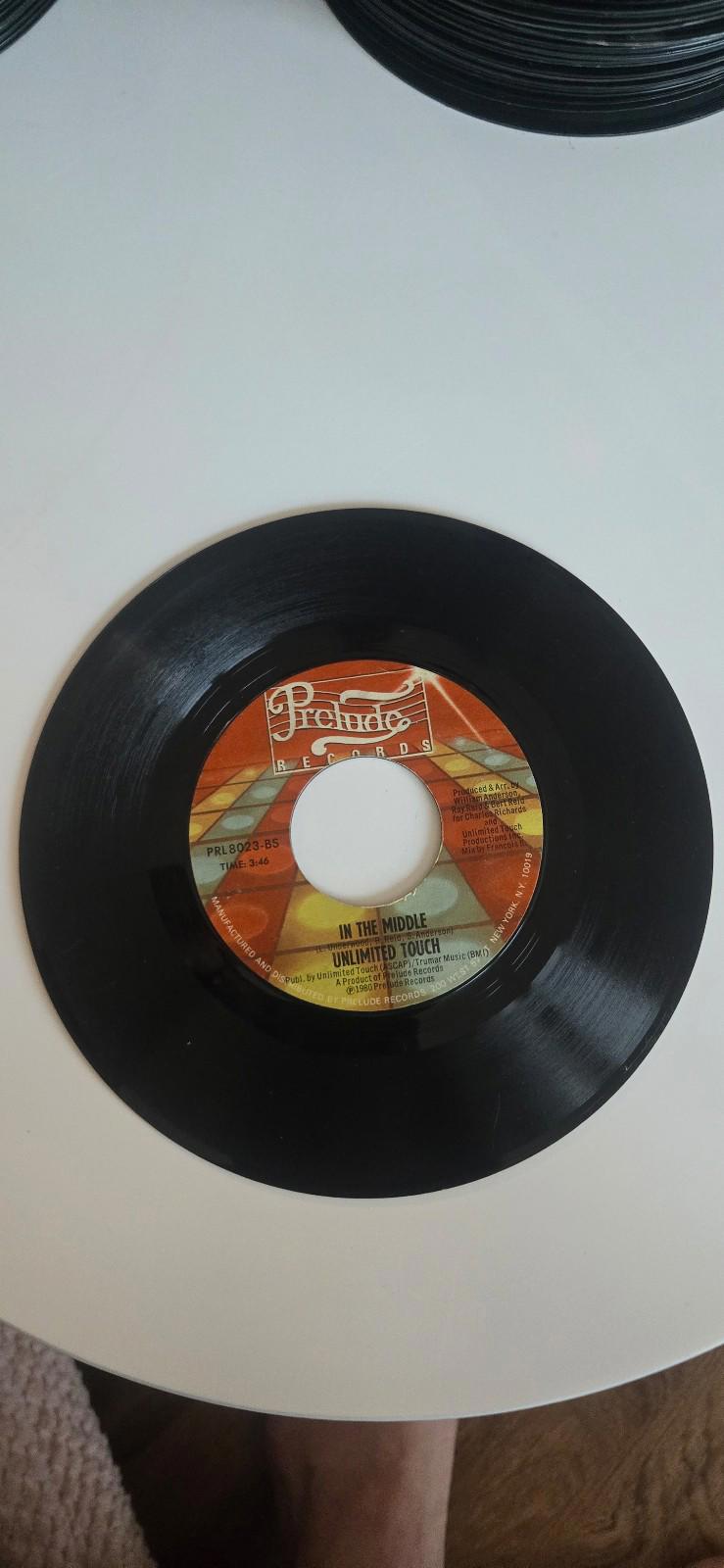 7-inch 45 RPM Vinyl "In The Middle""I Hear Music in the Streets" Unlimited Touch