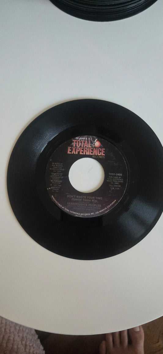 7-inch 45 RPM Vinyl  "Don't Waste Your Time" & Remix by Yarbrough & Peoples.