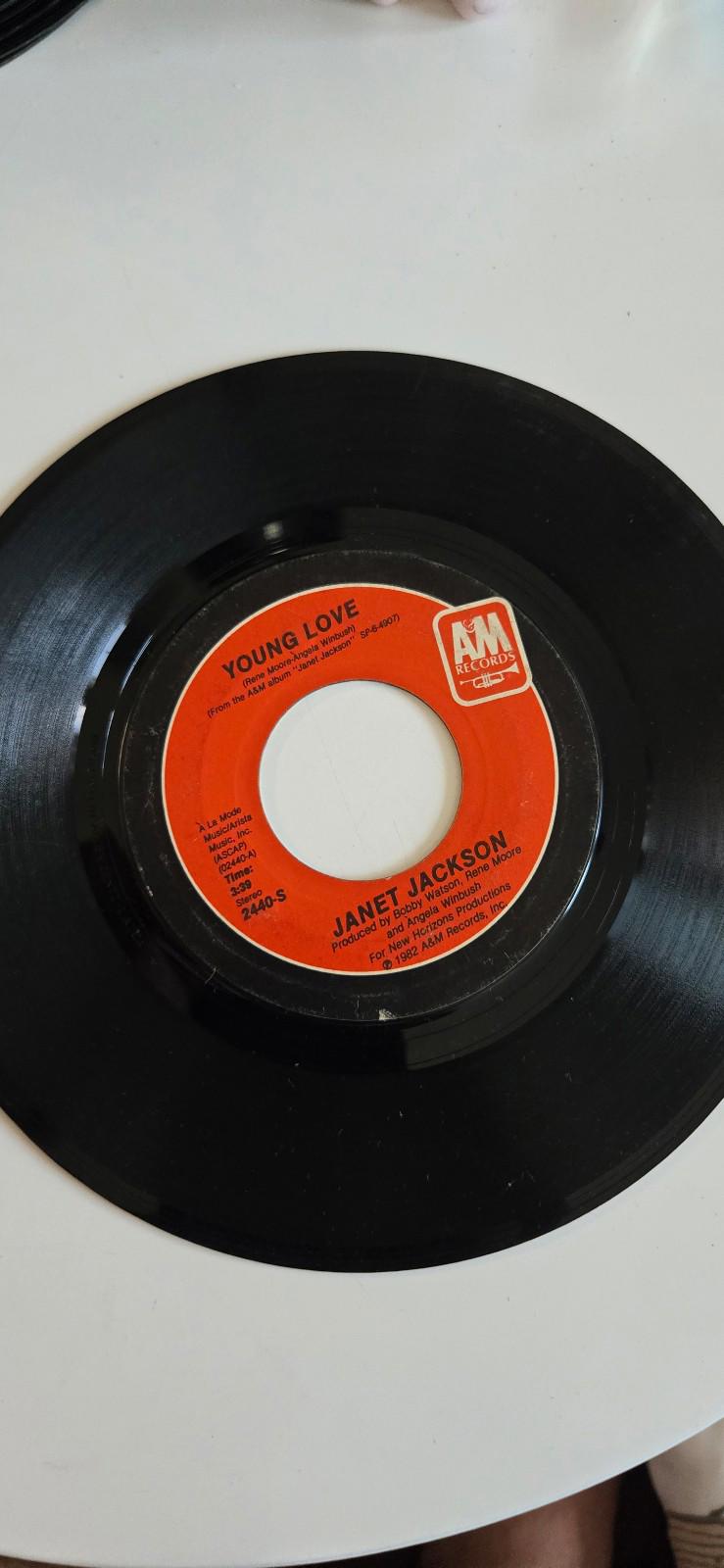 7-inch 45rpm vinyl single by janet jackson The Magic Is Working" & "Young Love"