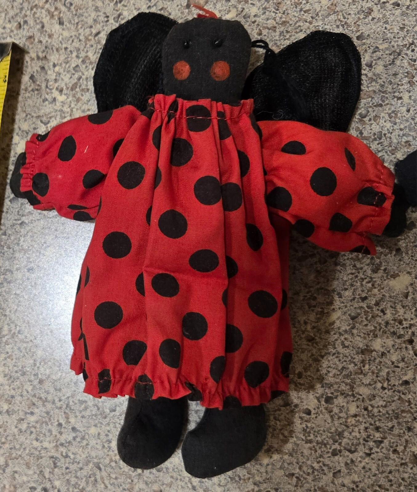 Ladybug Friend and Vintage African American Folk Art Hand Sewn Baby Rag Doll