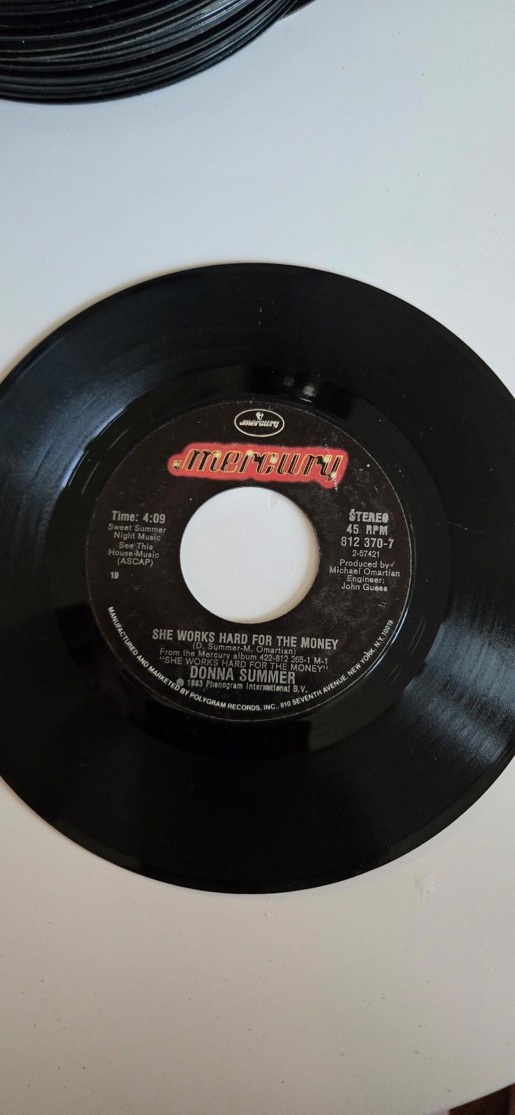 7-inch 45 RPM Vinyl RecordShe Works Hard For The MoneyI Do Believe (I Fell In Lo