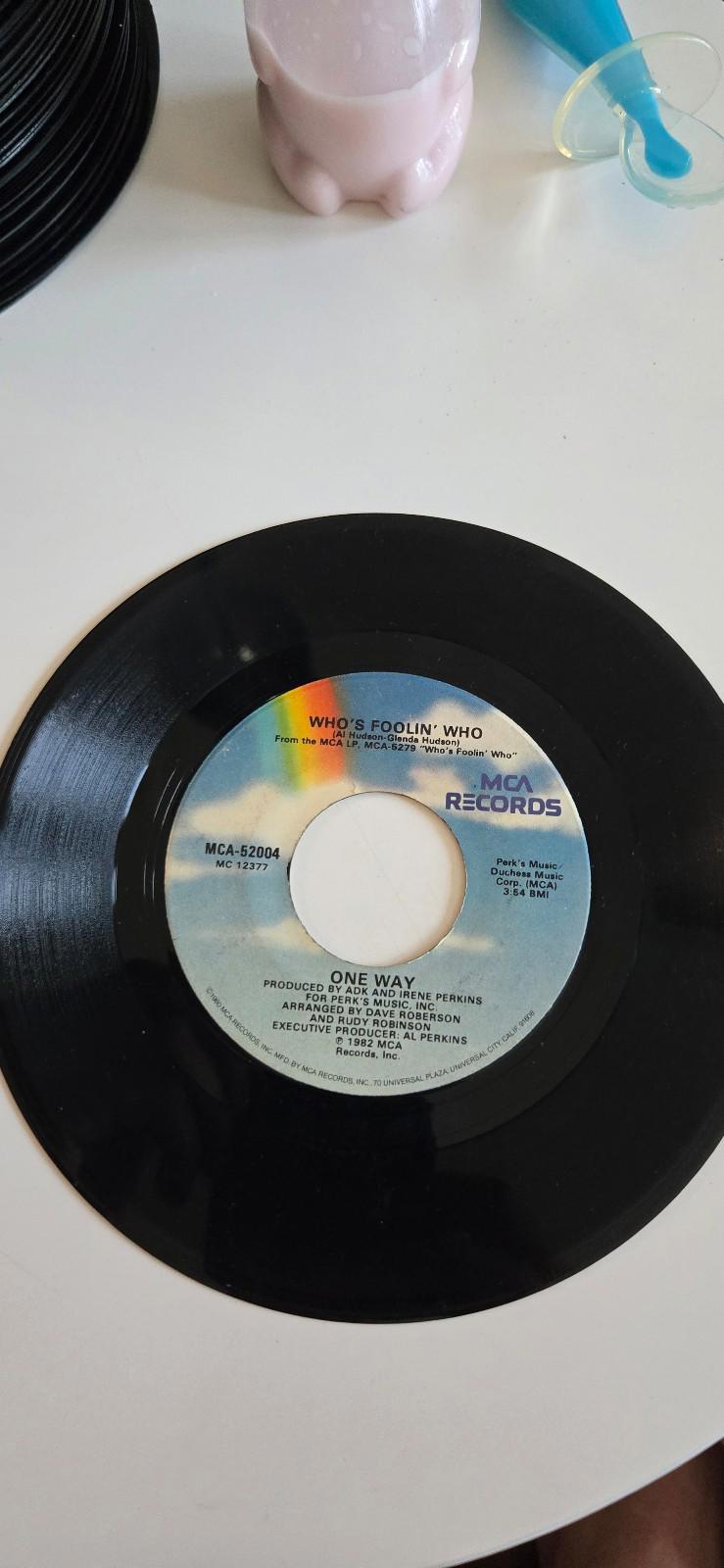 7-inch vinyl single by the group One Way Who's Foolin' Who, & "Sweet Lady" 1982