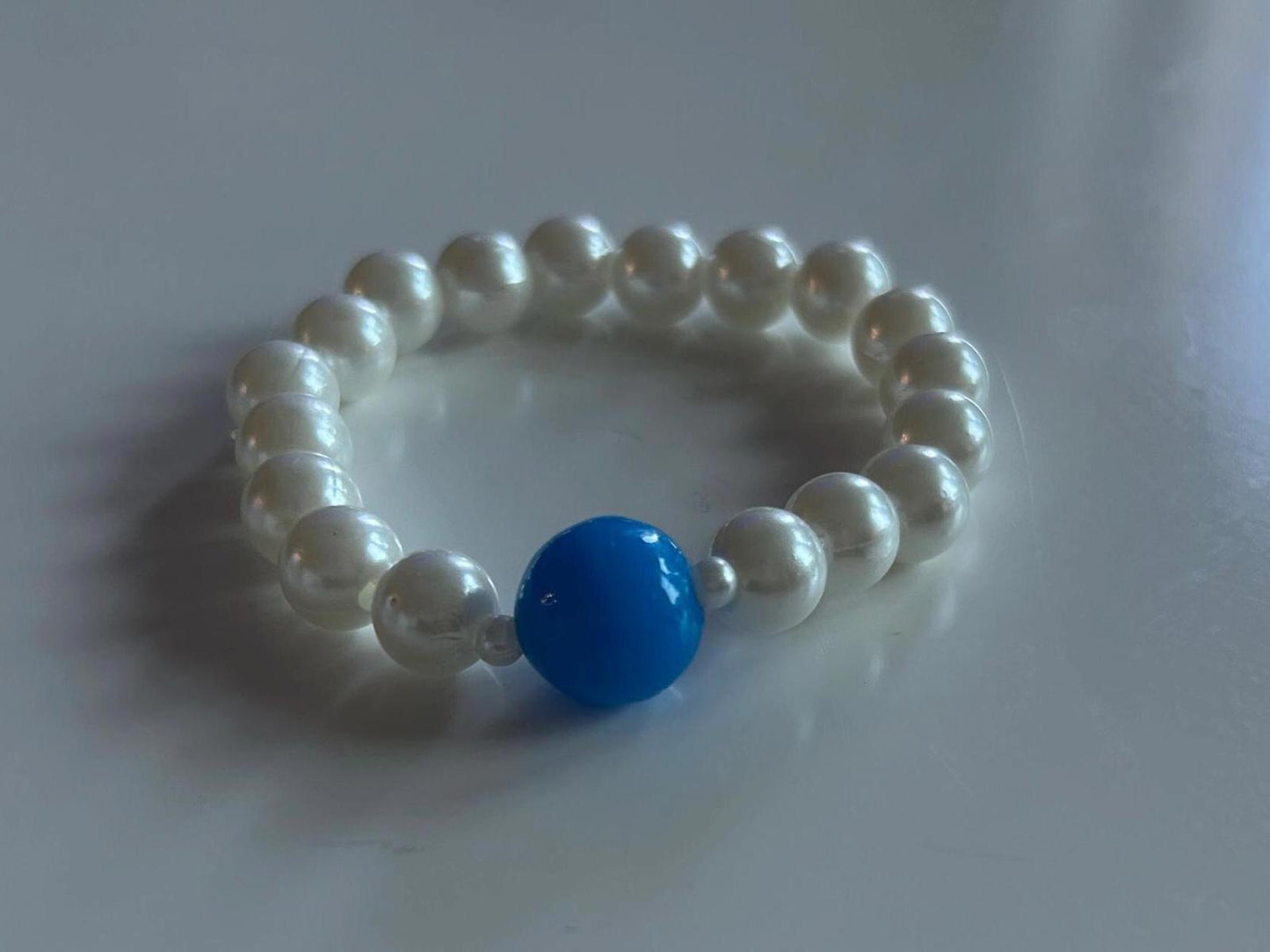 Elegant Pearl Bracelet with Blue Accent Bead
