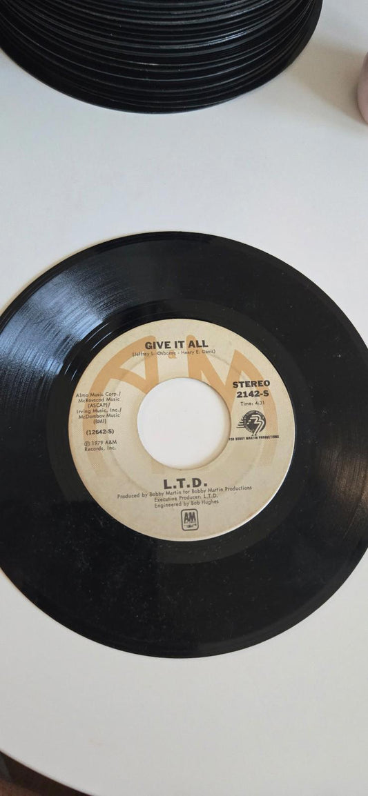 7-inch vinyl "Dance 'N' Sing 'N'", & "Give It All" by L.T.D.