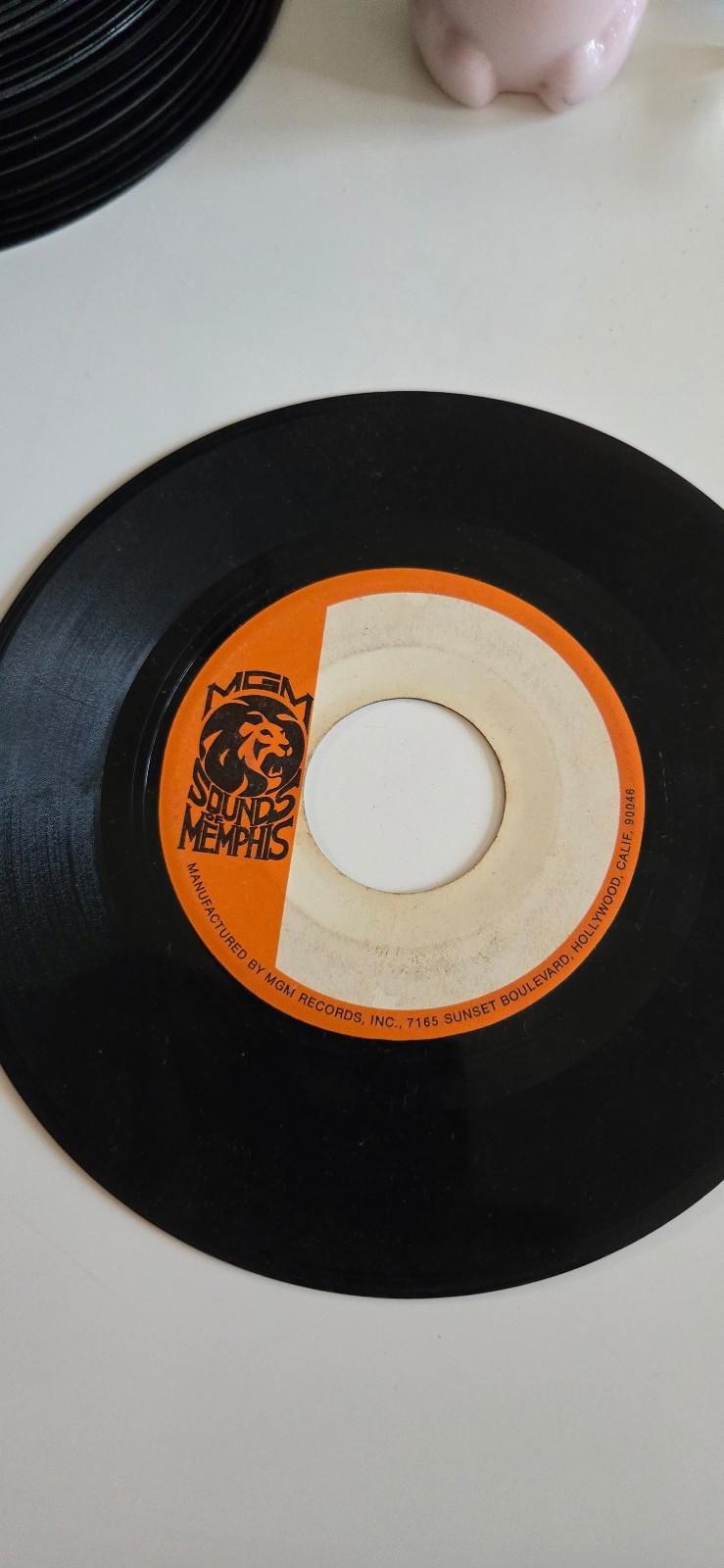 7-inch 45 RPM vinylTouching Me" by The Ovations.