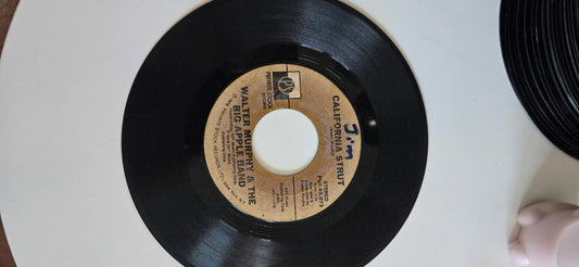 7-inch 45 RPM Vinyl A Fifth of Beethoven" and "California Strut". by Walter Murh