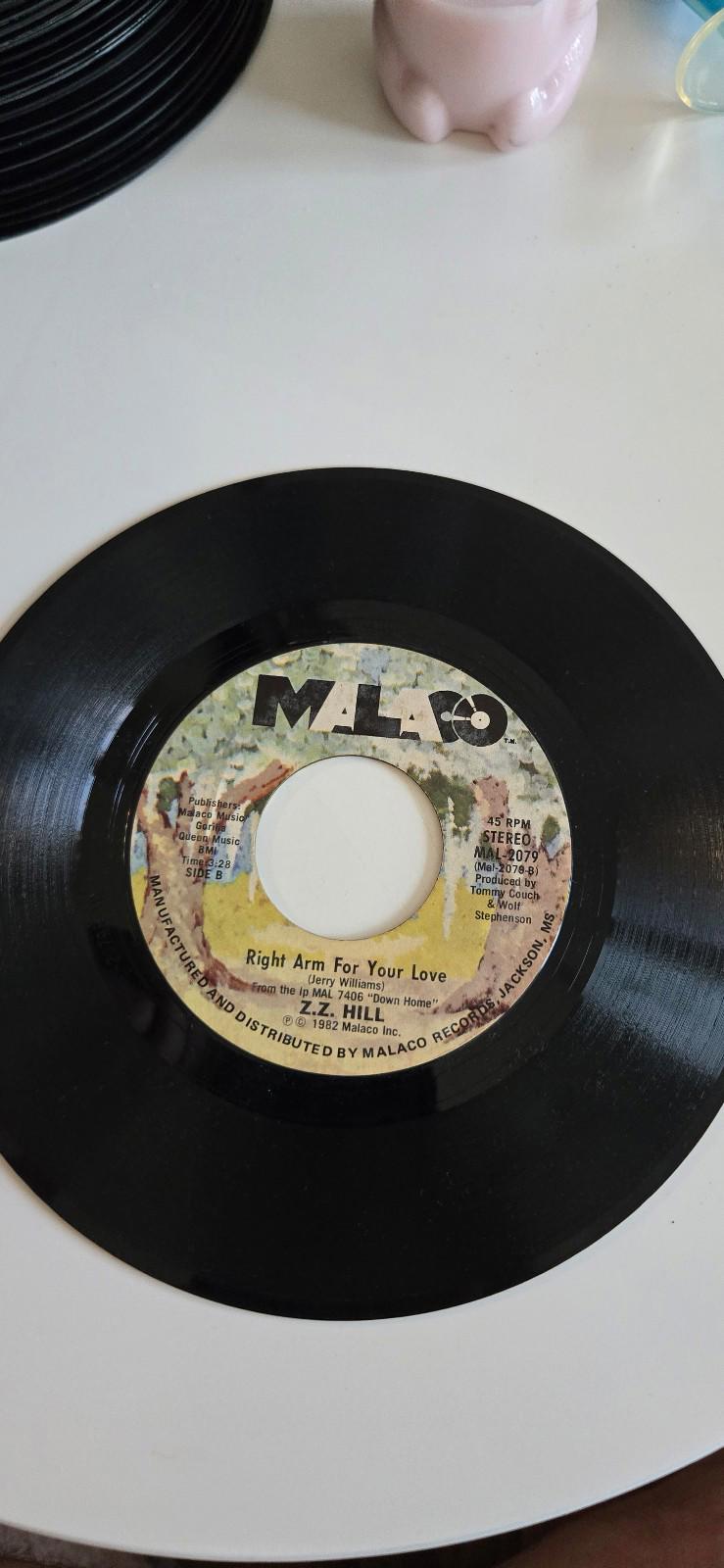 Right Arm For Your Love7-inch 45 RPM vinyl record of Z.Z. Hill's "Cheating In Th