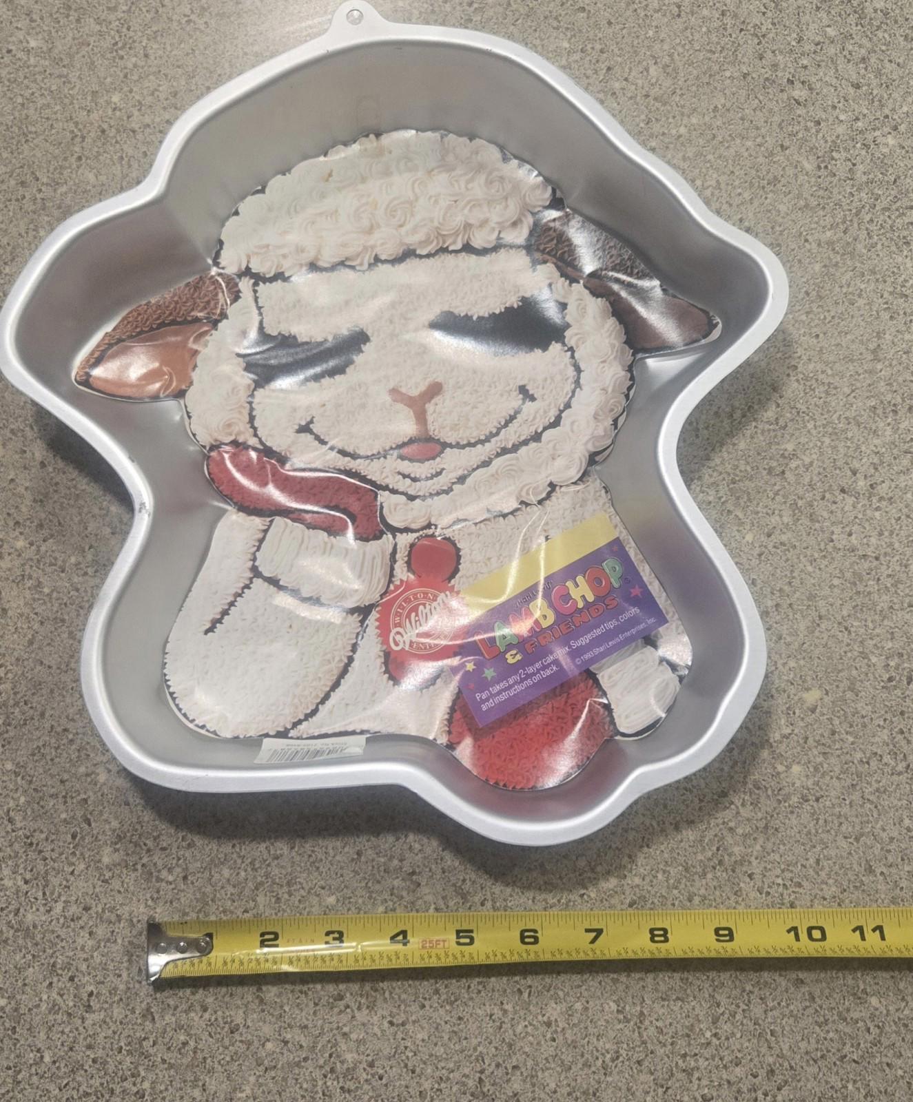 Wilton Vintage Cake Pans 10 PCs Playboy, Elmo, Pooh, Barney, Lamb chop Make Your Own Memories