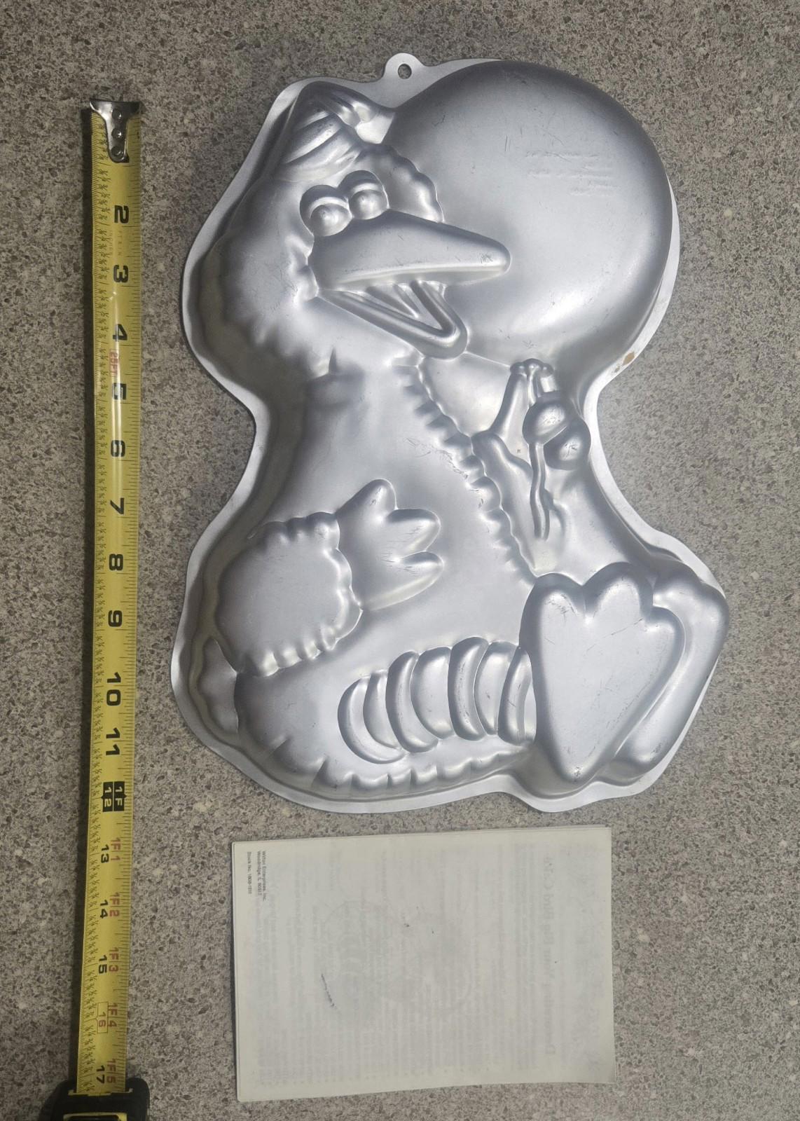 Wilton Vintage Cake Pans 10 PCs Playboy, Elmo, Pooh, Barney, Lamb chop Make Your Own Memories