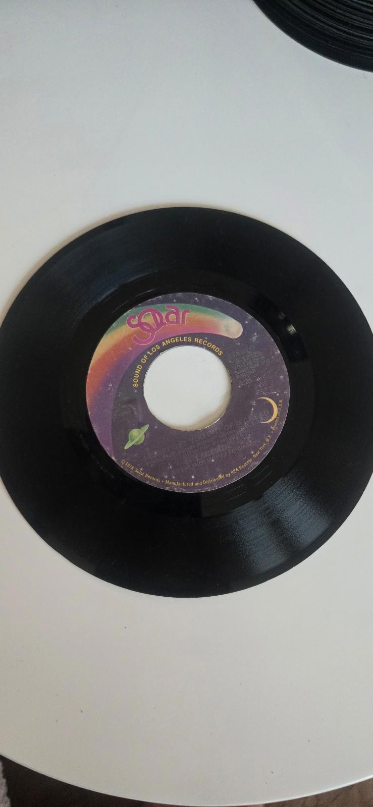7-inch 45 RPM Vinyl Record"I Still Can't Get Over Loving You"
