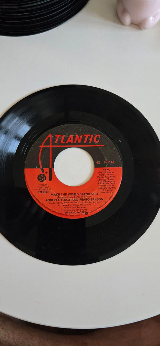 7-inch vinyl 45 RPM LPOnly Heaven Can Wait"Make the World Stand Still" by Robert