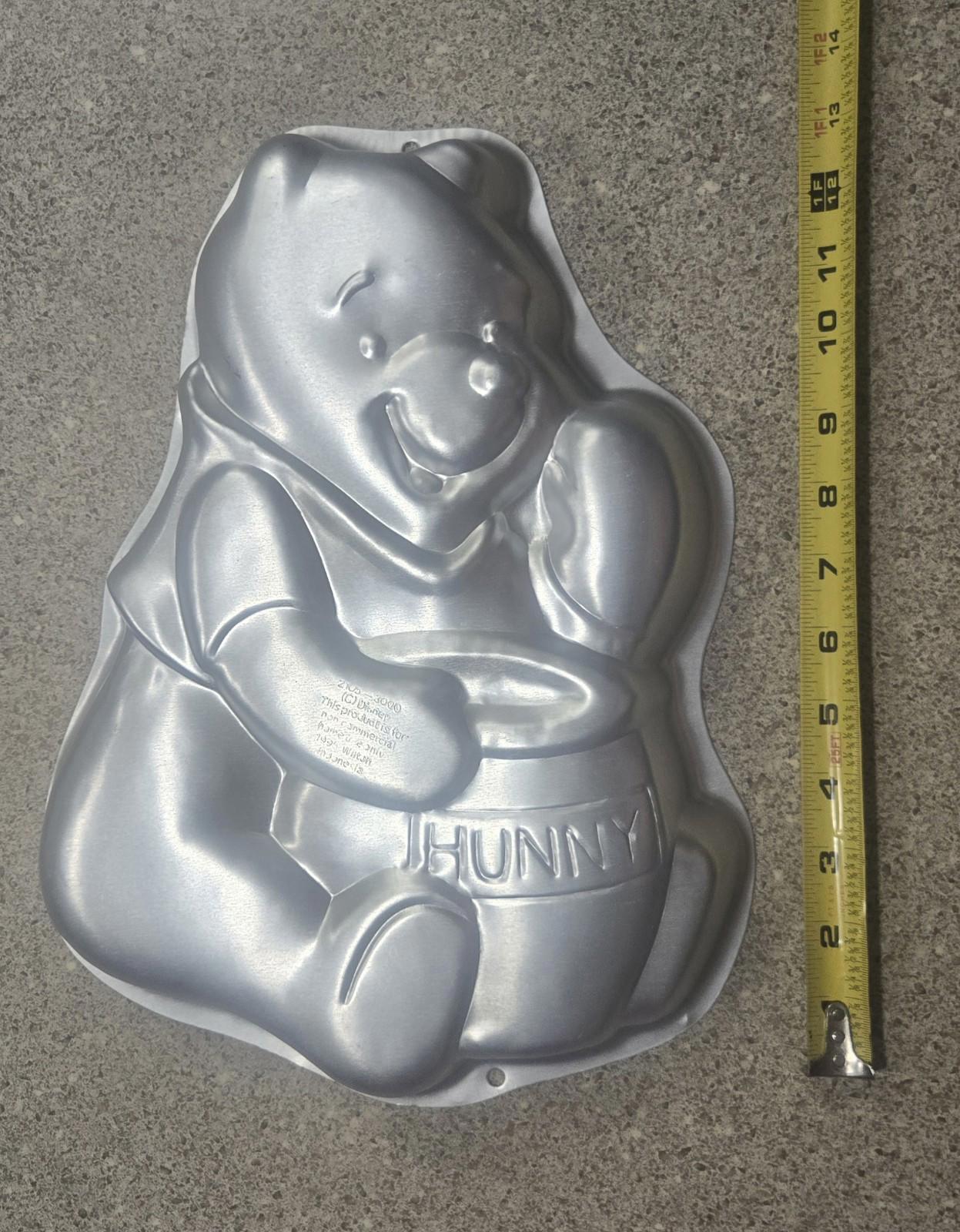 Wilton Vintage Cake Pans 10 PCs Playboy, Elmo, Pooh, Barney, Lamb chop Make Your Own Memories